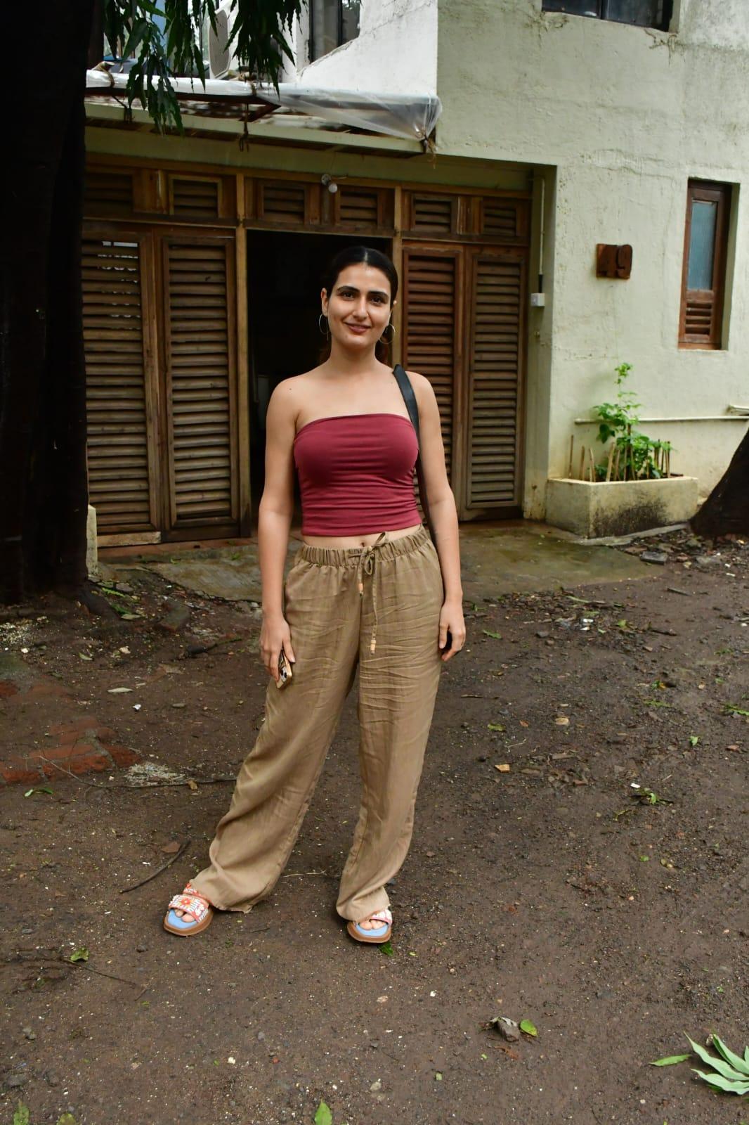 Fatima Sana Shaikh effortlessly combined comfort and style as she strolled around town in relaxed trousers and a maroon tube top.